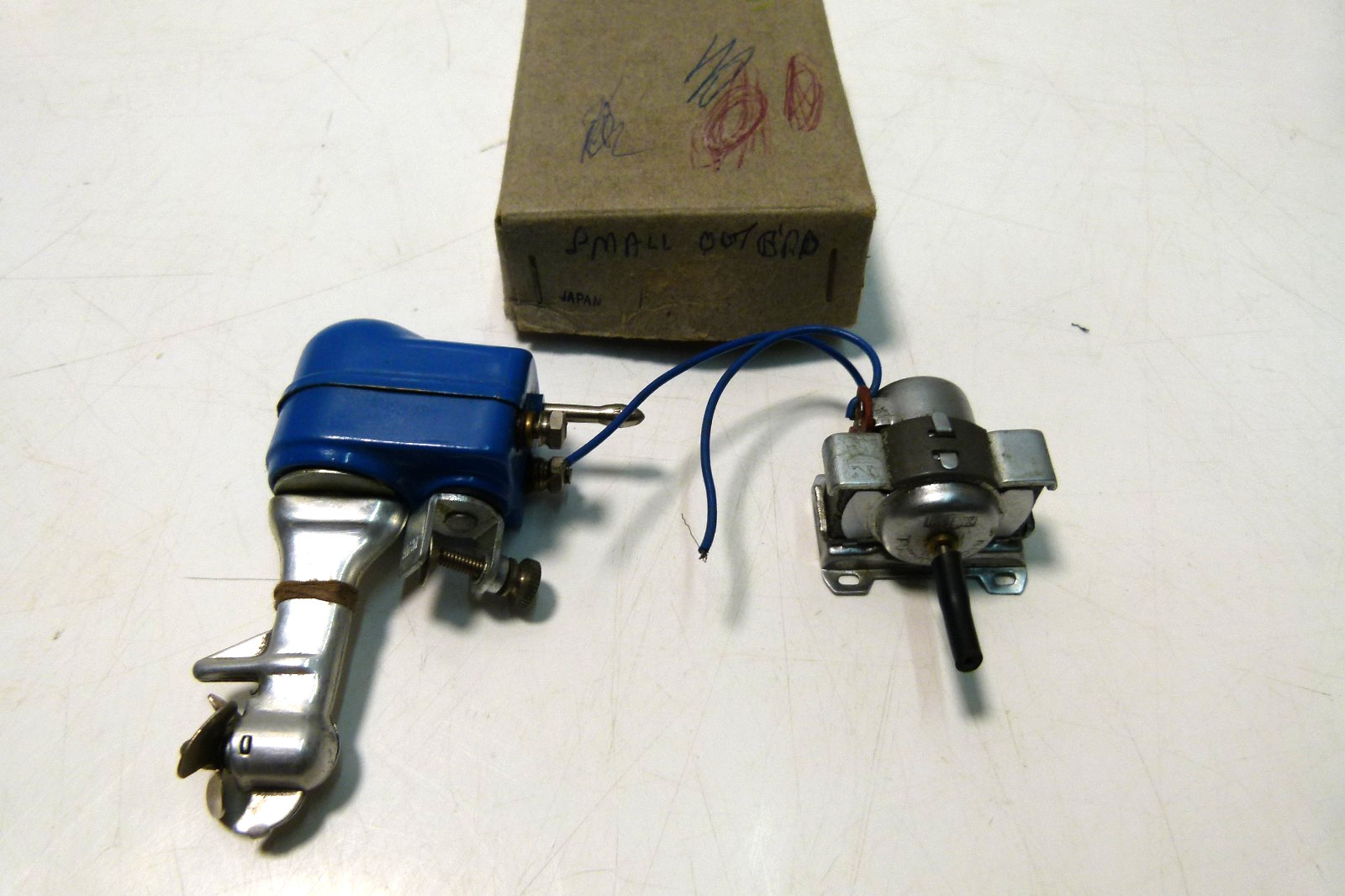 VINTAGE TOY OUTBOARD MOTOR PLUS ANOTHER MOTOR MADE IN JAPAN.